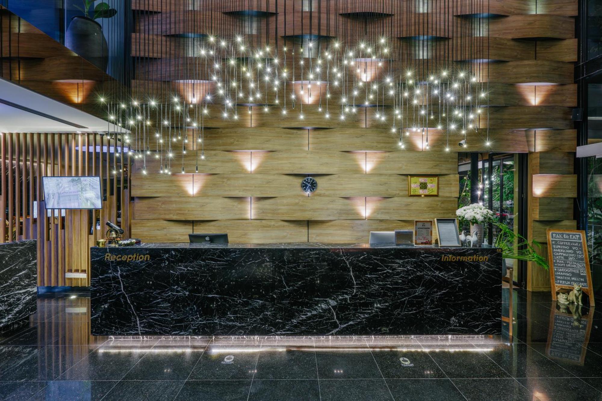 Rak Elegant Hotel Patong Buitenkant foto