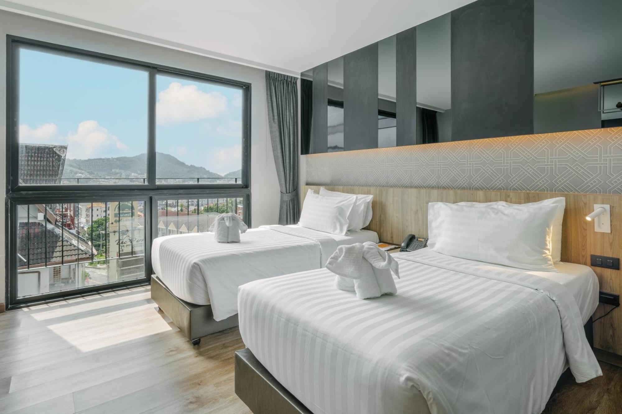 Rak Elegant Hotel Patong Buitenkant foto